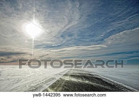 Windblown snow over road, Iceland View Large Photo Image Stock Photography - Windblown snow over road, Iceland. Fotosearch