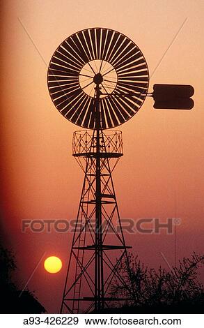 Stock Photo - Windmill for pumping water. Fotosearch