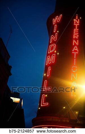 Windmill International sign in a facade at night in Soho, London, England, UK View Large Photo Image Stock Photo - Windmill International sign in a facade at night in Soho, London, England, UK. Fotosearch