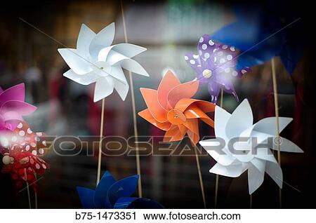 Stock Image - Windmill toys. Fotosearch