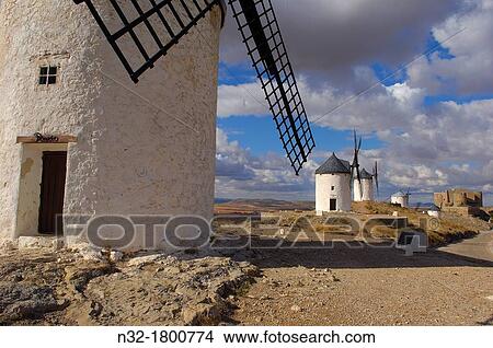 Windmills and Castle of the Knights of St John of Jerusalem, Consuegra, Toledo province, Route of Don Quixote, Castilla-La Mancha, Spain. View Large Photo Image Picture - Windmills and Castle of the Knights of St John of Jerusalem, Consuegra, Toledo province, Route of Don Quixote, Castilla-La Mancha, Spain.. Fotosearch