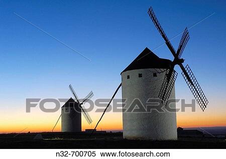 Windmills at Sunset. Campo de Criptana. Ciudad Real province, Ruta de don Quijote. Castilla-La Mancha, Spain View Large Photo Image Stock Photography - Windmills at Sunset. Campo de Criptana. Ciudad Real province, Ruta de don Quijote. Castilla-La Mancha, Spain. Fotosearch