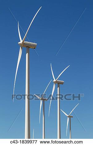 Windmills on a wind farm near Zahara de los Atunes CBdiz province, Andaluc? a, Spain View Large Photo Image Stock Photo - Windmills on a wind farm near Zahara de los Atunes CBdiz province, Andaluc? a, Spain. Fotosearch