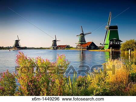 Windmills Zaanse Schans, Zaanstad, Zaandam, North Holland province, Holland, Netherlands, Europe View Large Photo Image Stock Photograph - Windmills Zaanse Schans, Zaanstad, Zaandam, North Holland province, Holland, Netherlands, Europe. Fotosearch