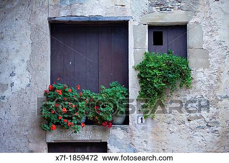 window, detail of facade in Els Hostalets d? en Bas, Garrotxa, Girona province Catalonia Spain View Large Photo Image Stock Image - window, detail of facade in Els Hostalets d? en Bas, Garrotxa, Girona province Catalonia Spain. Fotosearch