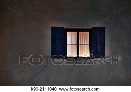 Window in the wall with electric candles burning, Ingolstadt, Bavaria, Germany, Europe. View Large Photo Image Stock Image - Window in the wall with electric candles burning, Ingolstadt, Bavaria, Germany, Europe.. Fotosearch