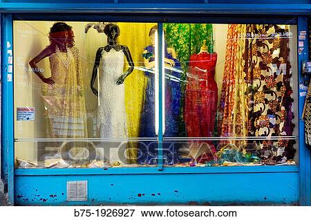 Window of a fashion store with three mannequins View Large Photo Image Stock Photo - Window of a fashion store with three mannequins. Fotosearch