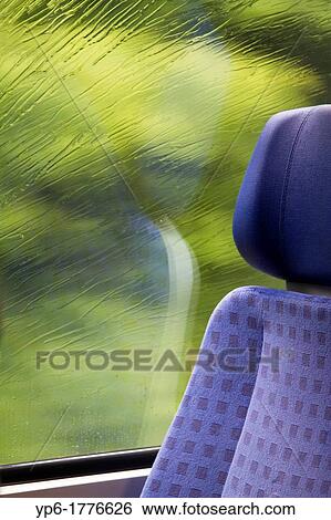Stock Photograph - window of a train with raindrops, Rhineland-Palatinate, Germany. Fotosearch