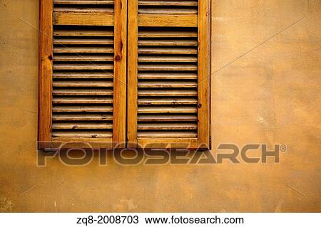 Stock Image - Window on vintage texture wall. Siena-Italy. Fotosearch