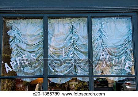 Window shop with draped curtains and enamel letters Beaumont en Auge Calvados 14 Normandy France View Large Photo Image Stock Photo - Window shop with draped curtains and enamel letters Beaumont en Auge Calvados 14 Normandy France. Fotosearch
