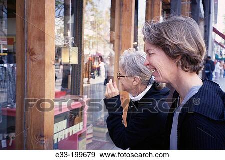 Window shopping View Large Photo Image Stock Photo - Window shopping. Fotosearch