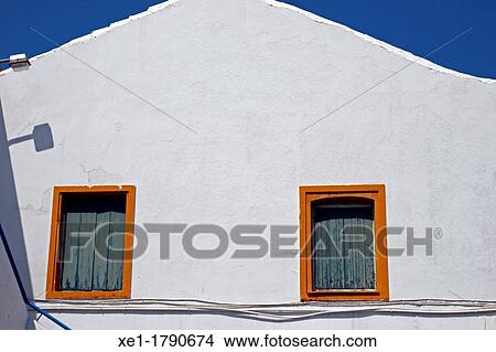 Picture - windows, housing, Agios Nikolaos, Crete, Greece. Fotosearch