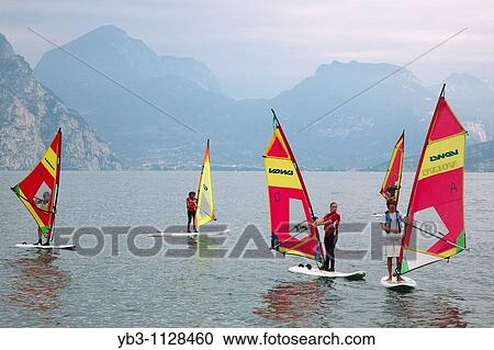 Windsurfers, Lake Garda, Veneto, Italy View Large Photo Image Stock Image - Windsurfers, Lake Garda, Veneto, Italy. Fotosearch