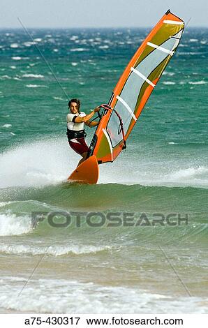 Stock Photo - windsurfing in tarifa with strong levante. Fotosearch