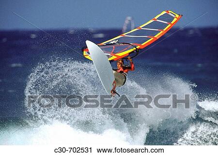Stock Image - Windsurfing Maui, Hookipa Beach, Hawaii, USA. Fotosearch