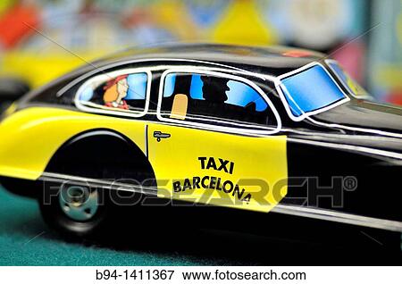 Windup toy of Barcelona taxi for sale in Vin? on design shop, Barcelona. Catalonia, Spain View Large Photo Image Stock Photo - Windup toy of Barcelona taxi for sale in Vin? on design shop, Barcelona. Catalonia, Spain. Fotosearch