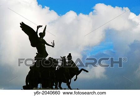 Winged Victory on the Wellington Arch in the heart of London, England, on a fine day. View Large Photo Image Stock Image - Winged Victory on the Wellington Arch in the heart of London, England, on a fine day.. Fotosearch