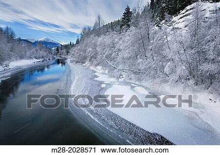 Winter along the Birkenhead River near Pemberton, Coast Mountains British Columbia. View Large Photo Image Stock Image - Winter along the Birkenhead River near Pemberton, Coast Mountains British Columbia.. Fotosearch