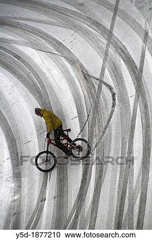 winter cycling problems on the street covered with fresh snow, Geneva, Switzerland View Large Photo Image Stock Image - winter cycling problems on the street covered with fresh snow, Geneva, Switzerland. Fotosearch