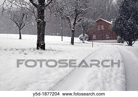 Picture - winter landscape, heavy snowfall, Promasens, Fribourg canton, Switzerland. Fotosearch