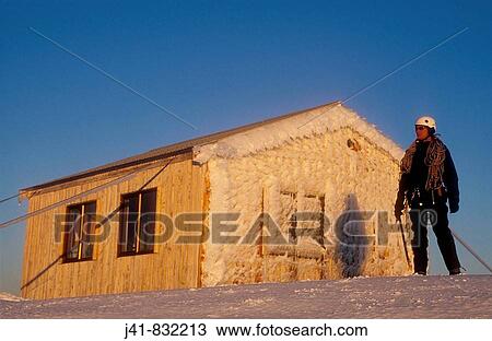 Winter sunset on Syme Hut and climber Fantham's Peak Mt Taranaki Egmont National Park Taranaki View Large Photo Image Stock Image - Winter sunset on Syme Hut and climber Fantham's Peak Mt Taranaki Egmont National Park Taranaki. Fotosearch