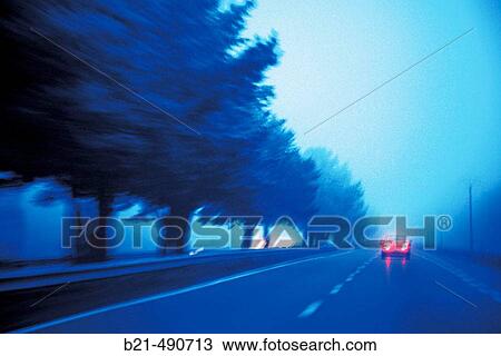 Winter traffic in the Landes district. Gascony. France. View Large Photo Image Stock Image - Winter traffic in the Landes district. Gascony. France.. Fotosearch