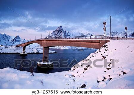Winter view of bridge on E10 connecting Hamnoya and Toppoya islands, Lofoten islands, Norway View Large Photo Image Stock Photography - Winter view of bridge on E10 connecting Hamnoya and Toppoya islands, Lofoten islands, Norway. Fotosearch