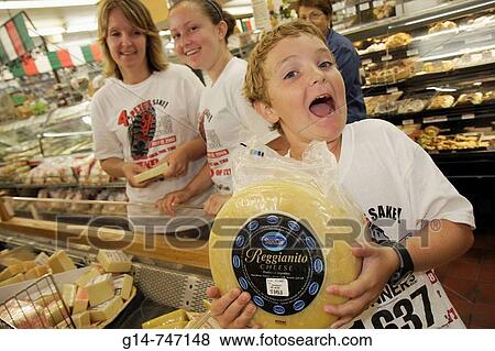 Wisconsin, Kenosha, Tenuta's Delicatessen Liquors and Wines, Italian market, Reggianito cheese View Large Photo Image Stock Photo - Wisconsin, Kenosha, Tenuta's Delicatessen Liquors and Wines, Italian market, Reggianito cheese. Fotosearch
