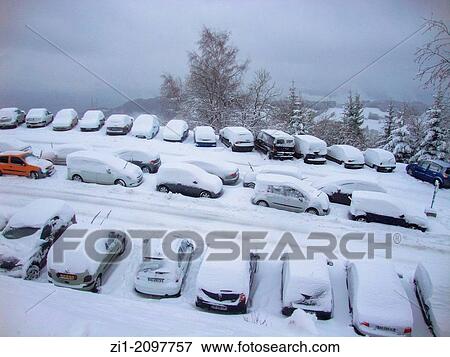 with snow covered cars at parking place in Prapoutel, France View Large Photo Image Stock Photo - with snow covered cars at parking place in Prapoutel, France. Fotosearch