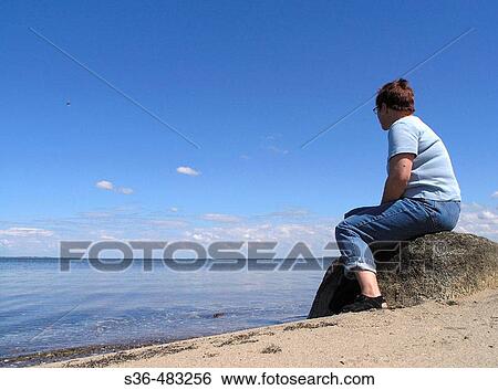 Woamen enjoying the View of Struer bay, Limfjorden, Jutland Denmark View Large Photo Image Stock Photograph - Woamen enjoying the View of Struer bay, Limfjorden, Jutland Denmark. Fotosearch