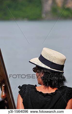Woman 43 with hat looking away, Halong Bay, Vietnam View Large Photo Image Stock Photograph - Woman 43 with hat looking away, Halong Bay, Vietnam. Fotosearch