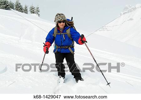 woman, 48, back country skiing in the Rocky Mountains in Banff National Park, Alberta, Canada View Large Photo Image Stock Photo - woman, 48, back country skiing in the Rocky Mountains in Banff National Park, Alberta, Canada. Fotosearch