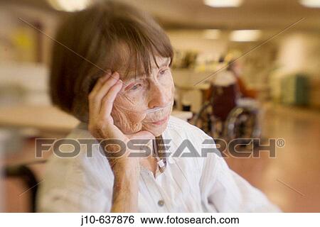 Woman, age 89, cardiac patient at nursing home. Lens blur. Poughkeepsie, NY. USA. View Large Photo Image Stock Photograph - Woman, age 89, cardiac patient at nursing home. Lens blur. Poughkeepsie, NY. USA.. Fotosearch