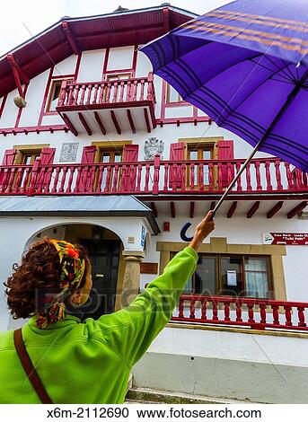 Woman and building. Burguete, Pyrenees. Navarre, Spain, Europe. View Large Photo Image Stock Image - Woman and building. Burguete, Pyrenees. Navarre, Spain, Europe.. Fotosearch