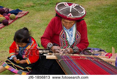 Woman and child weaving with traditional dress in Cusco Cuzco Peru South America View Large Photo Image Stock Image - Woman and child weaving with traditional dress in Cusco Cuzco Peru South America. Fotosearch
