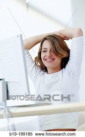 Woman and computer View Large Photo Image Stock Photography - Woman and computer. Fotosearch