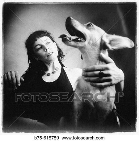Woman and dog View Large Photo Image Stock Photo - Woman and dog. Fotosearch