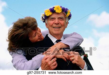 Woman and elderly man View Large Photo Image Stock Image - Woman and elderly man. Fotosearch