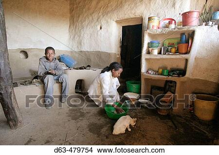 Woman and her brother preparing food at home in Adigrat. Ethiopia View Large Photo Image Picture - Woman and her brother preparing food at home in Adigrat. Ethiopia. Fotosearch