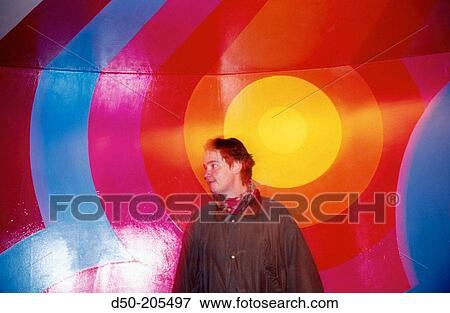 Stock Photo - Woman and strange wall. Alghero. Italy. Fotosearch
