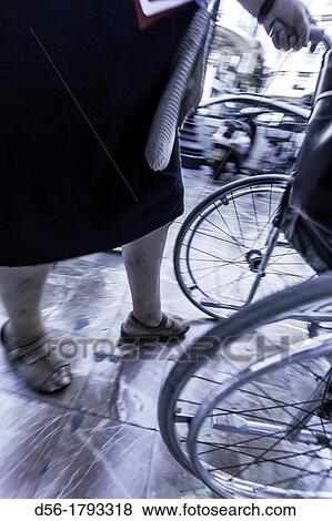 woman and wheelchair, Valencia, Spain View Large Photo Image Stock Photo - woman and wheelchair, Valencia, Spain. Fotosearch