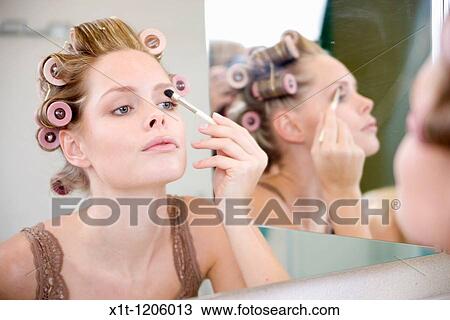 Woman applying eyeshadow. View Large Photo Image Stock Image - Woman applying eyeshadow.. Fotosearch