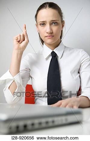 Stock Photograph - woman asking question. Fotosearch