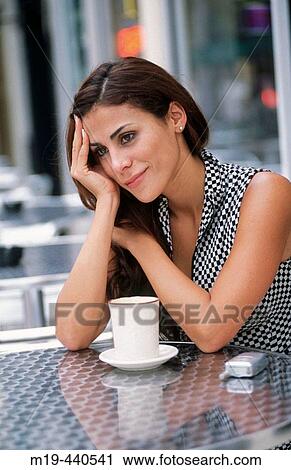 woman at a cafe View Large Photo Image Stock Image - woman at a cafe. Fotosearch