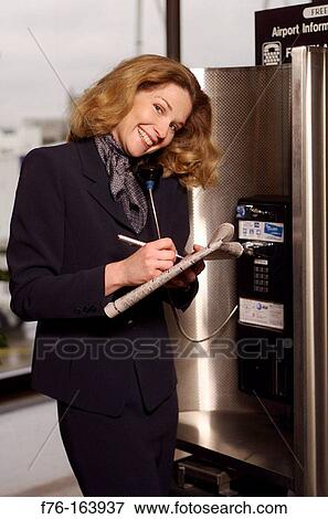 Stock Photo - Woman at airport. Fotosearch