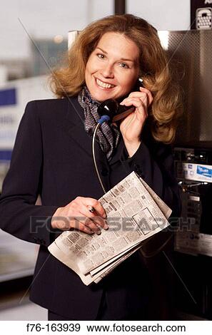 Woman at airport View Large Photo Image Stock Photo - Woman at airport. Fotosearch