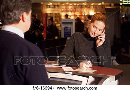 Woman at airport View Large Photo Image Stock Photo - Woman at airport. Fotosearch