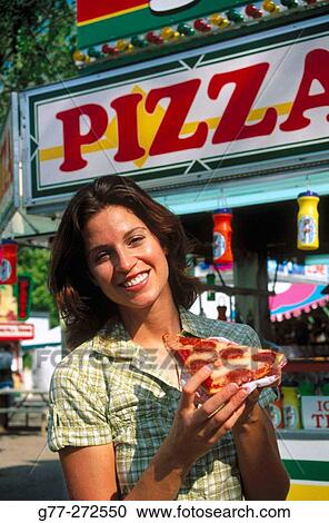 Woman at amusement park. County fair. Miami. Florida. USA View Large Photo Image Stock Image - Woman at amusement park. County fair. Miami. Florida. USA. Fotosearch