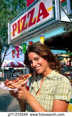 Stock Photo - Woman at amusement park. County fair. Miami. Florida. USA. Fotosearch