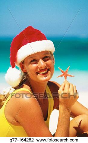 Woman at beach in Christmas. Dominican Republic View Large Photo Image Stock Image - Woman at beach in Christmas. Dominican Republic. Fotosearch